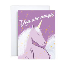 Load image into Gallery viewer, purple unicorn illustration with yellow stars surrounding on a purple background with 'you are magic' in script font on top greeting card