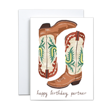 Load image into Gallery viewer, a pair of brown cowboy boots with dark red, yellow, and teal details with the phrase 'happy birthday, partner' on white background birthday greeting card