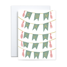 Load image into Gallery viewer, light teal banner strung multiple times with pink tassels with yellow letters spelling out 'congratulations' on each individual banner greeting card