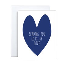 Load image into Gallery viewer, simple dark blue heart with 'sending you lots of love' in white in the center on a white background greeting card
