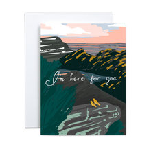 Load image into Gallery viewer, abstract mountain landscape with grey rocks and dark green mountains and green foliage with a blue and pink sunset and two small yellow birds sitting next to each other gazing out with 'i'm here for you' in white script font across the middle greeting card