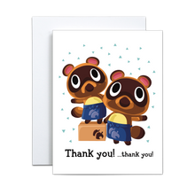 Load image into Gallery viewer, Illustration of characters Timmy and Tommy from animal crossing new horizons with teal triangle pattern in background with 'thank you... thank you' written in black in associated font at the bottom greeting card