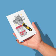 Load image into Gallery viewer, hand holding illustration of a typical scraper and small tub of spackle with yellow stars and &#39;you are spacktacular&#39; written in black thin font across greeting card
