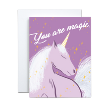 Load image into Gallery viewer, purple unicorn illustration with yellow stars surrounding on a purple background with &#39;you are magic&#39; in script font on top greeting card
