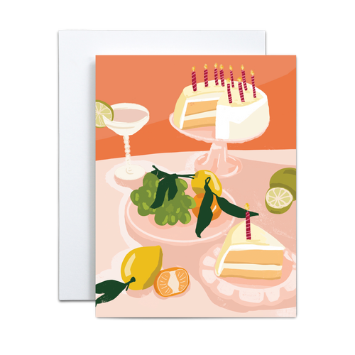 pink cake with candles and various citrus fruits and bubbly drink feast birthday greeting card