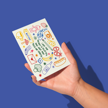 Load image into Gallery viewer, A hand holding a rectangular sticker sheet against a solid blue background. The sticker sheet features a white base with colorful doodles of everyday items like a coffee cup, strawberry, banana, hot dog, and a bottle, with the text 'I DON'T FLY HIGH ENOUGH TO ESCAPE TRICKS THAT ARE TRICKS'.
