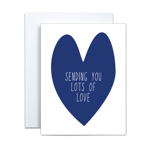 simple dark blue heart with 'sending you lots of love' in white in the center on a white background greeting card